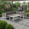 Outdoor corner sofa set with table and cushions in garden setting