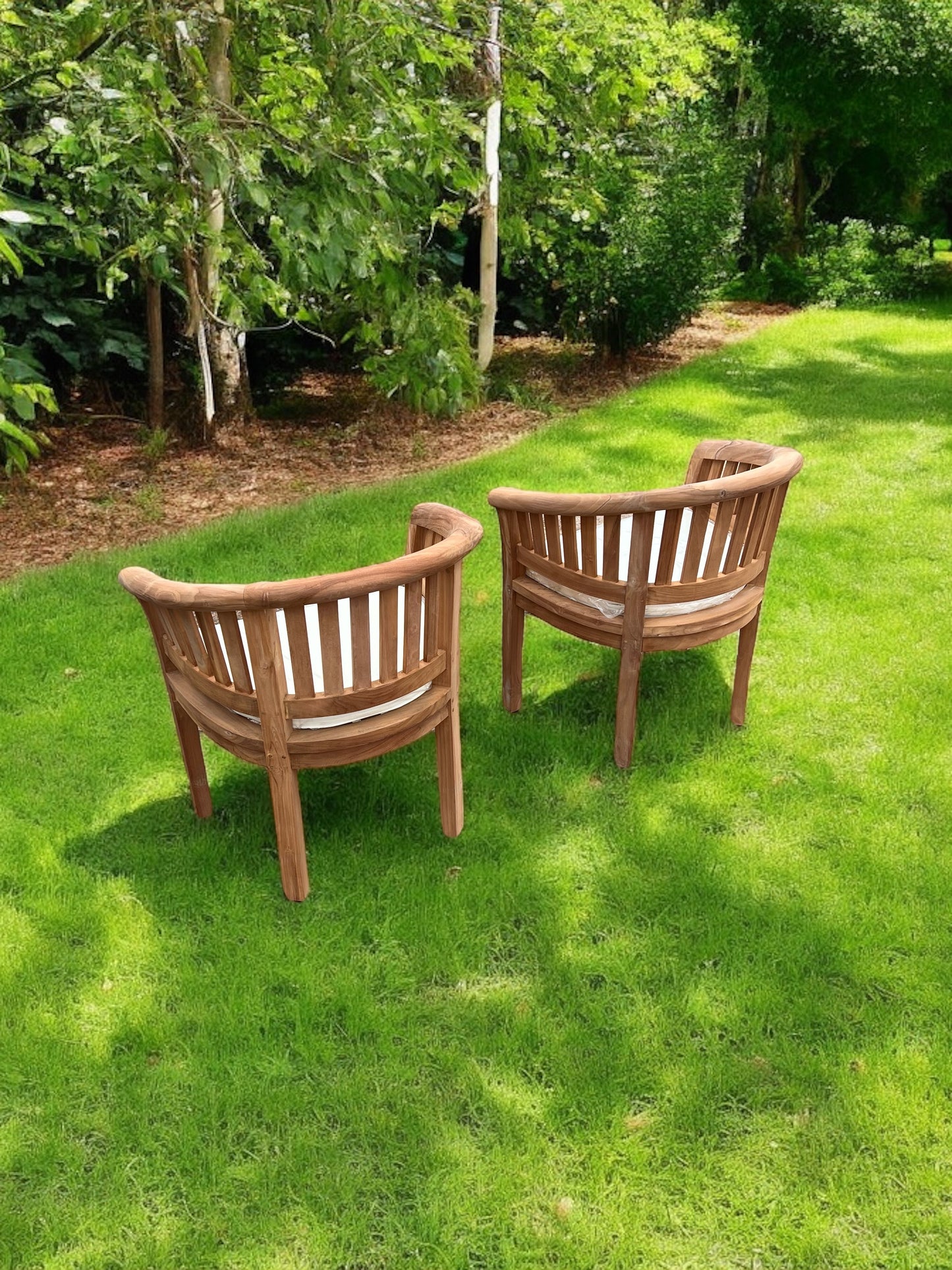 Two Teak Banana Chairs Vertical